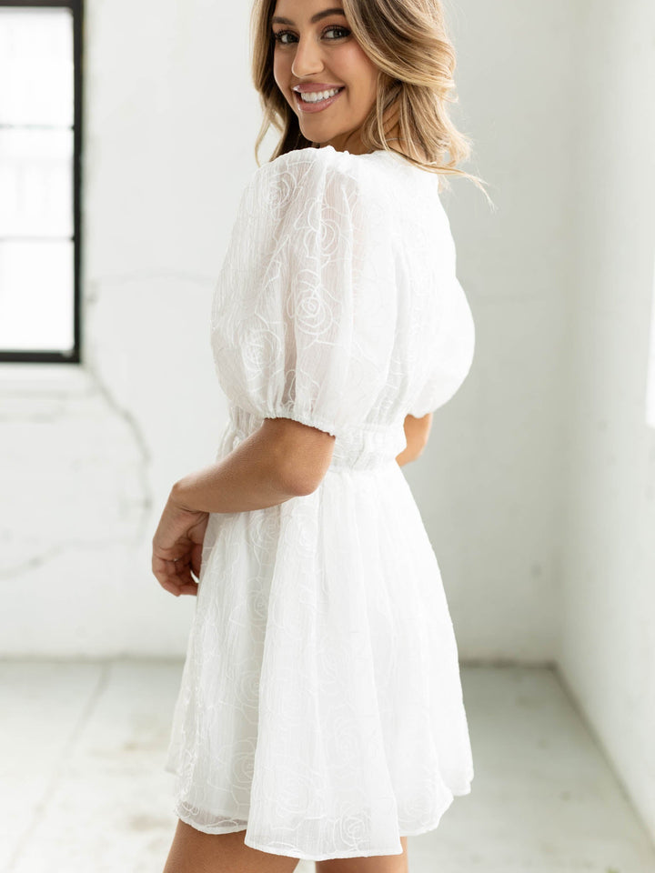 white floral smocked mini dress