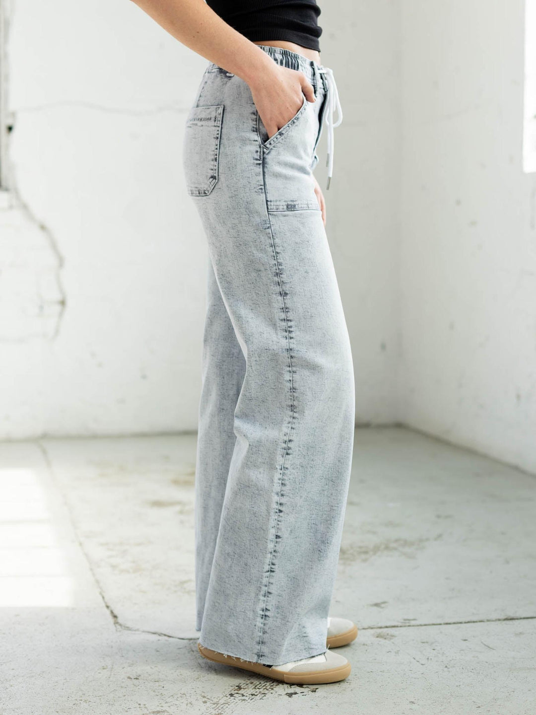 distressed denim with drawstring