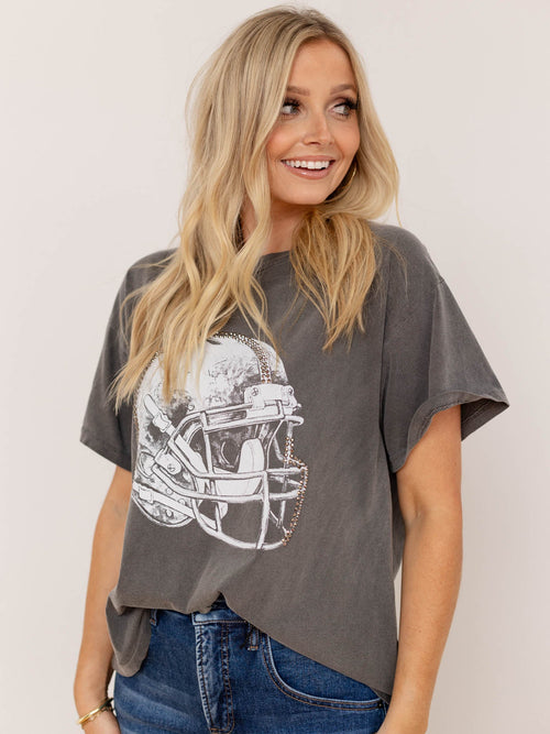 washed studded football helmet