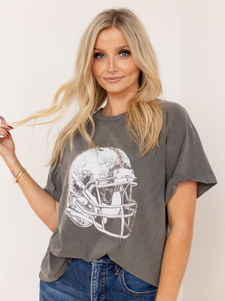 washed studded football helmet