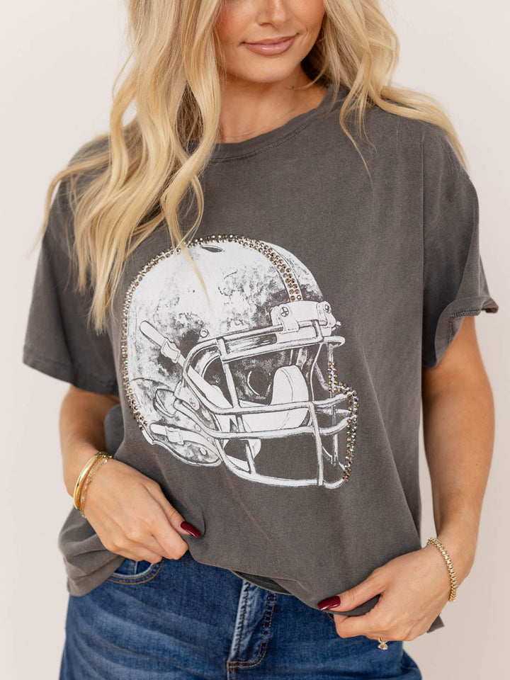 washed studded football helmet