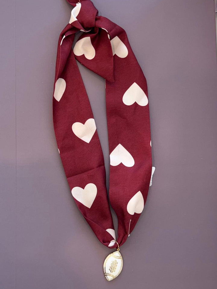 maroon white heart football necklace
