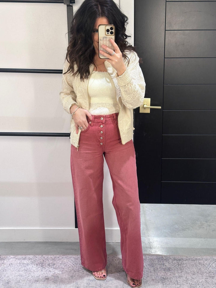 washed red colored high rise denim