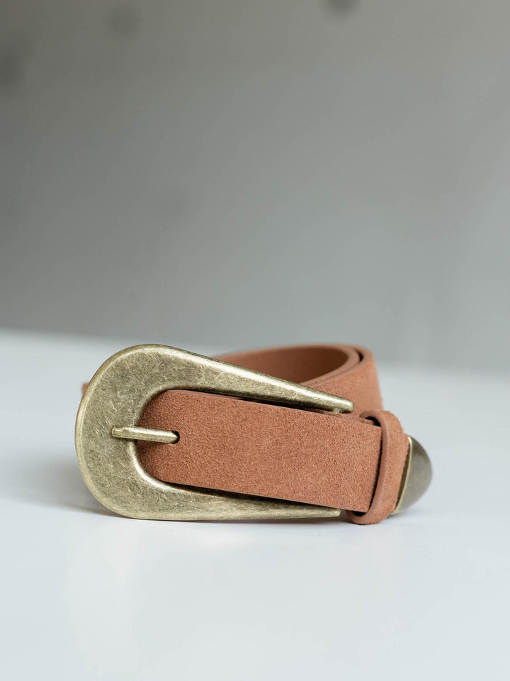 Free People Cannon Suede Belt in brown with a rounded, antique gold metal buckle.
