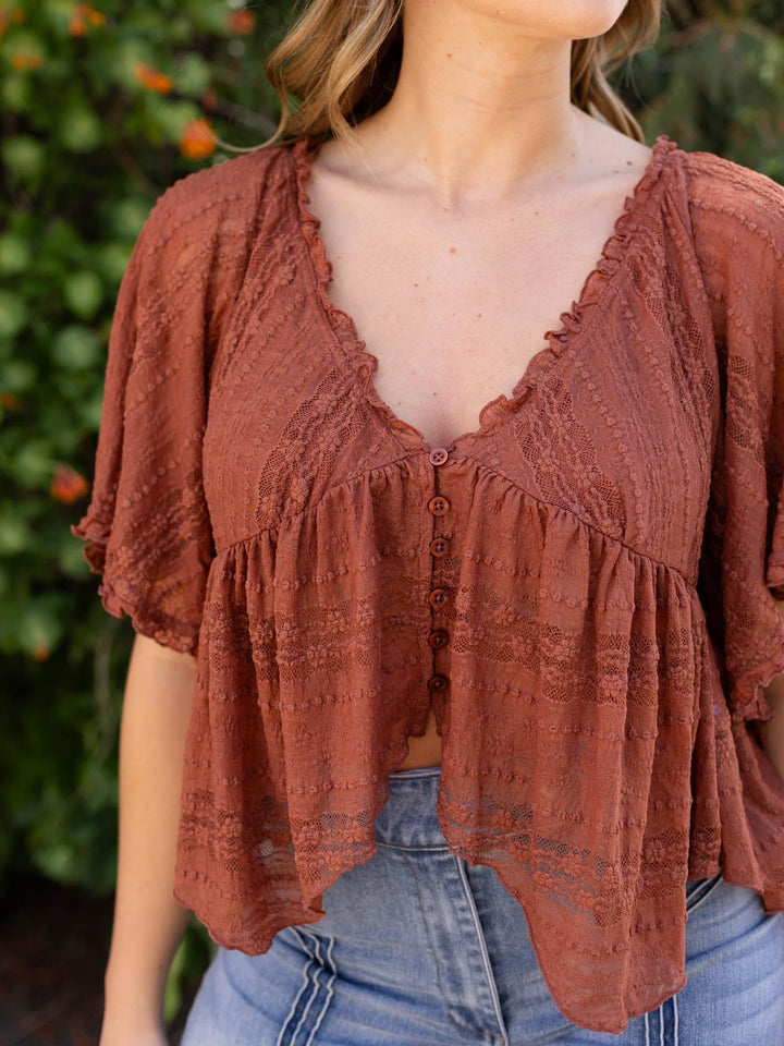 Free People In Your Dreams Lace Top in Toasted Cocoa, featuring a plunging v-neck and button front.