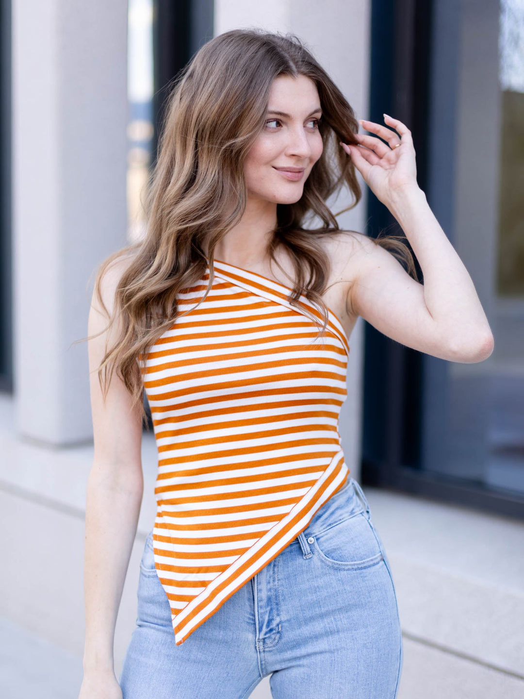 brown and white one shoulder tank