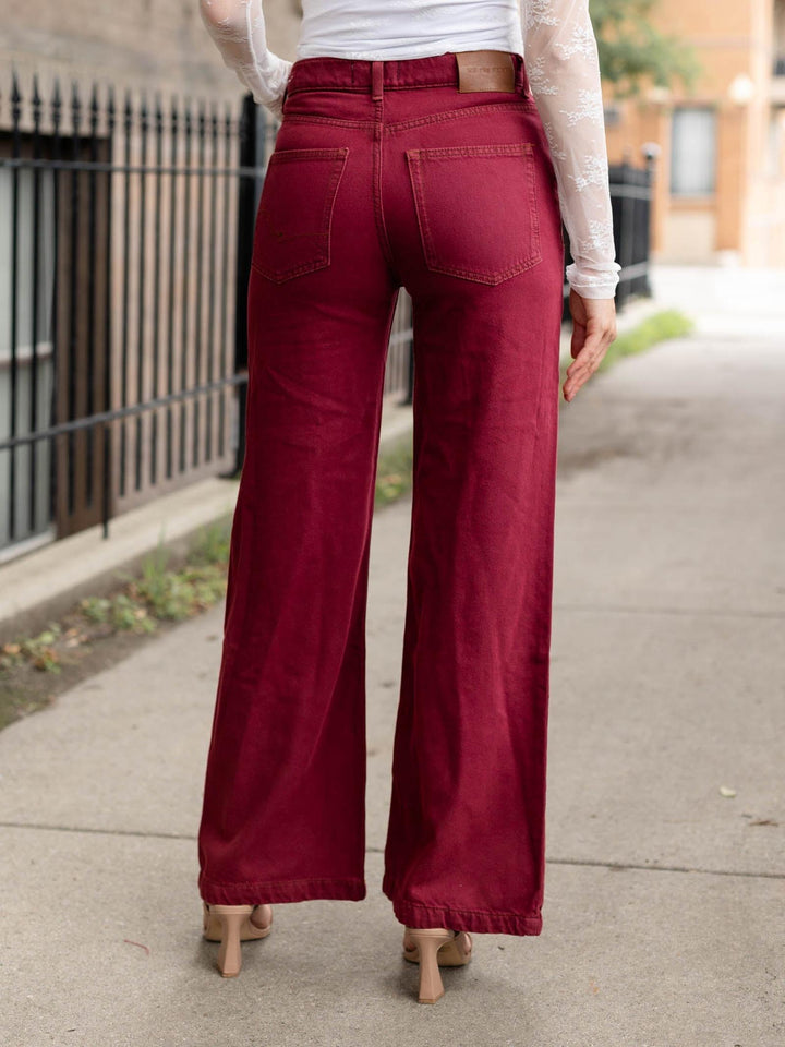 burgundy flared colored denim