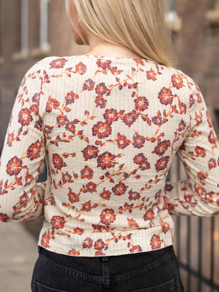 cream floral button front thermal top