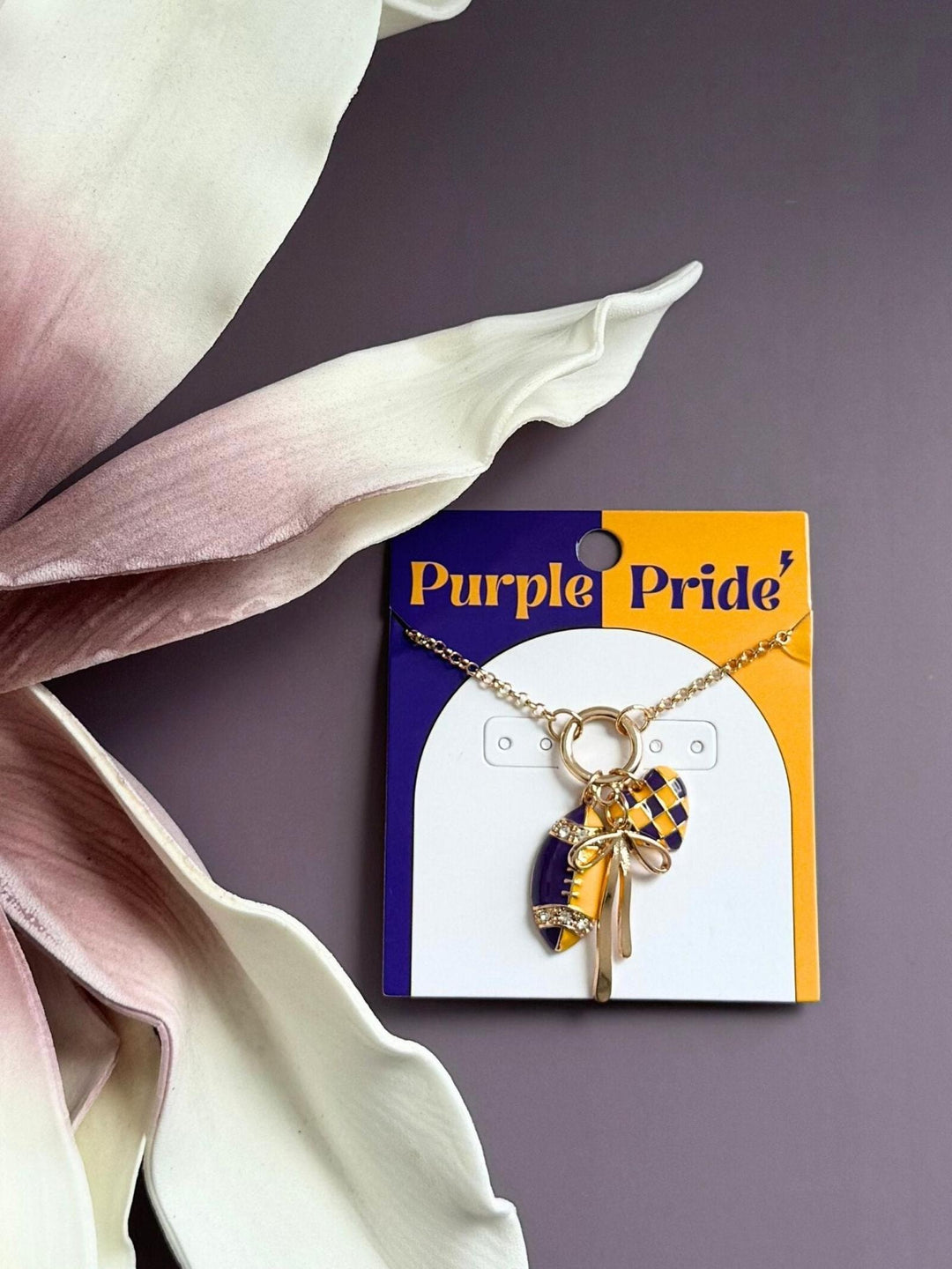 purple and yellow football necklace