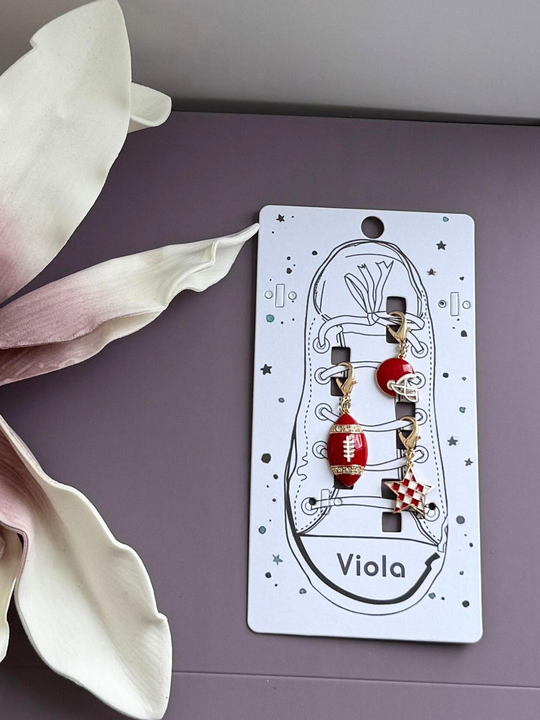 red and white football charms