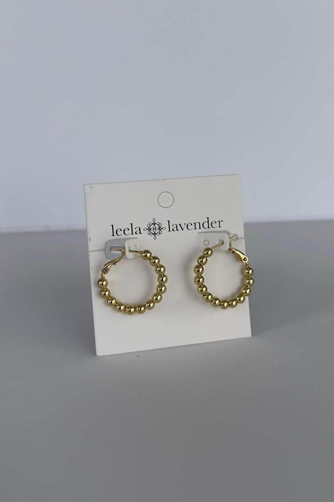 gold dipped ball hoop earrings