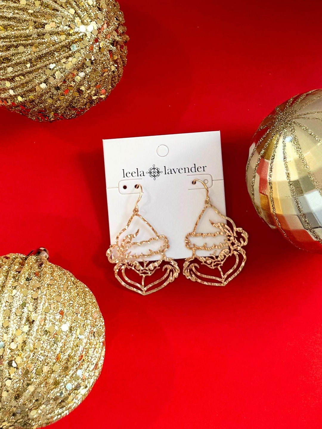 gold grinch cut out earrings