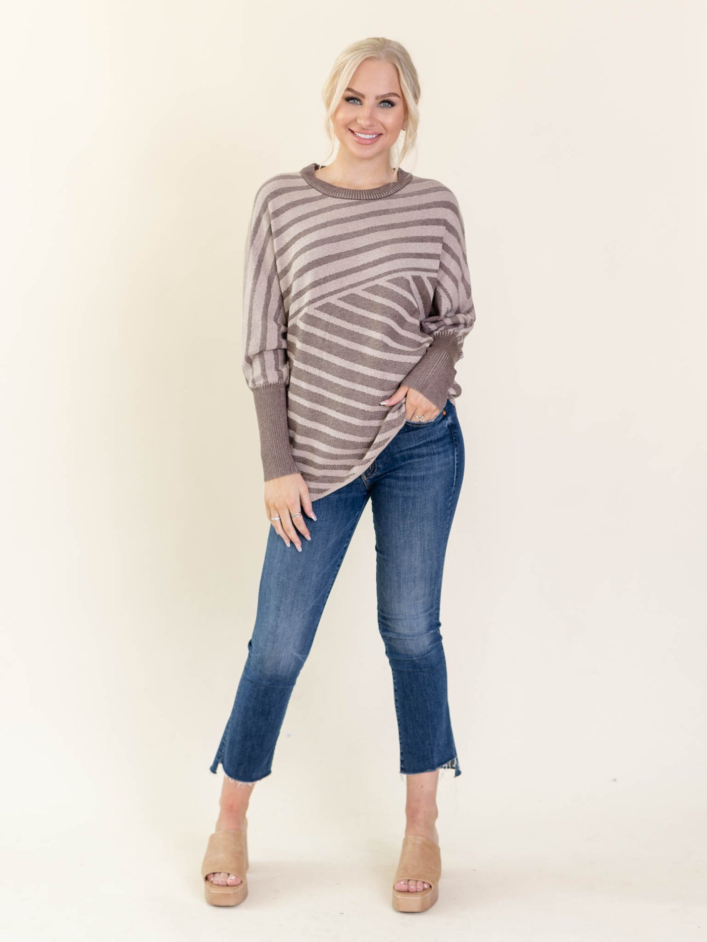striped brown sweater