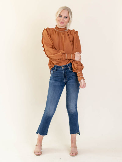rust orange frill blouse
