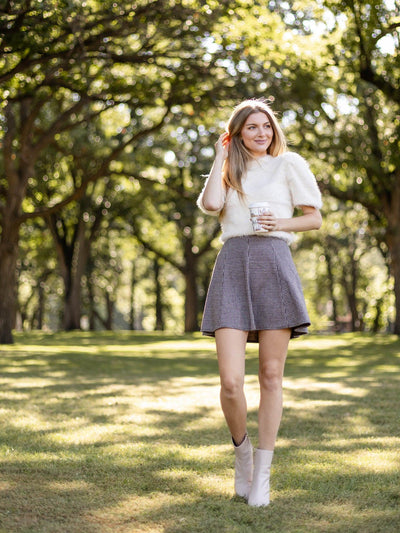 cream fuzzy top