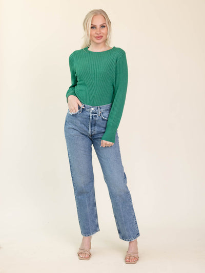 green colored sweater