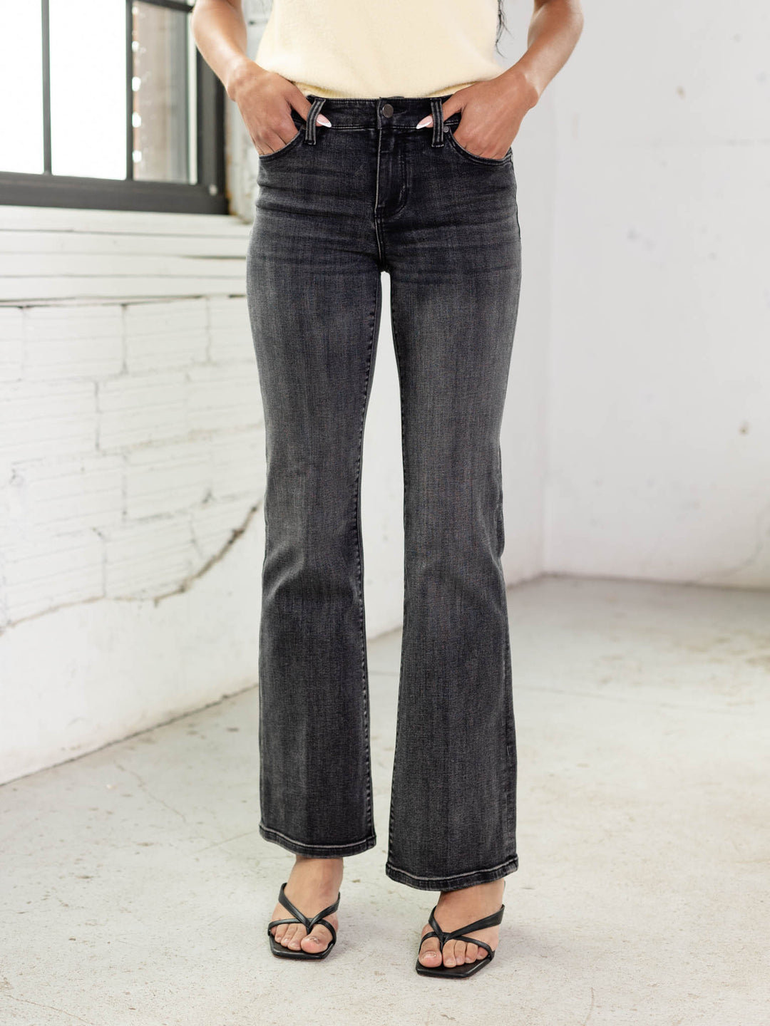 washed black bootcut denim