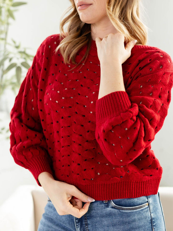 red eyelet wide neck sweater