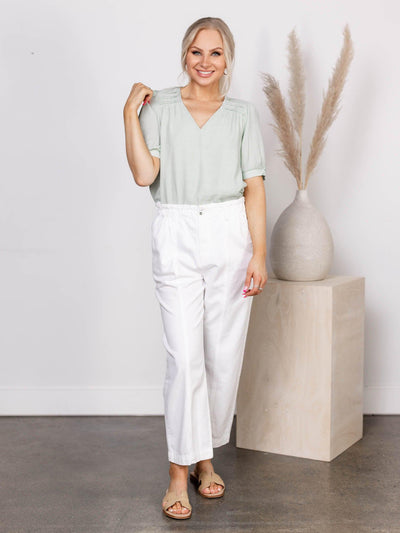 sage green pleated blouse