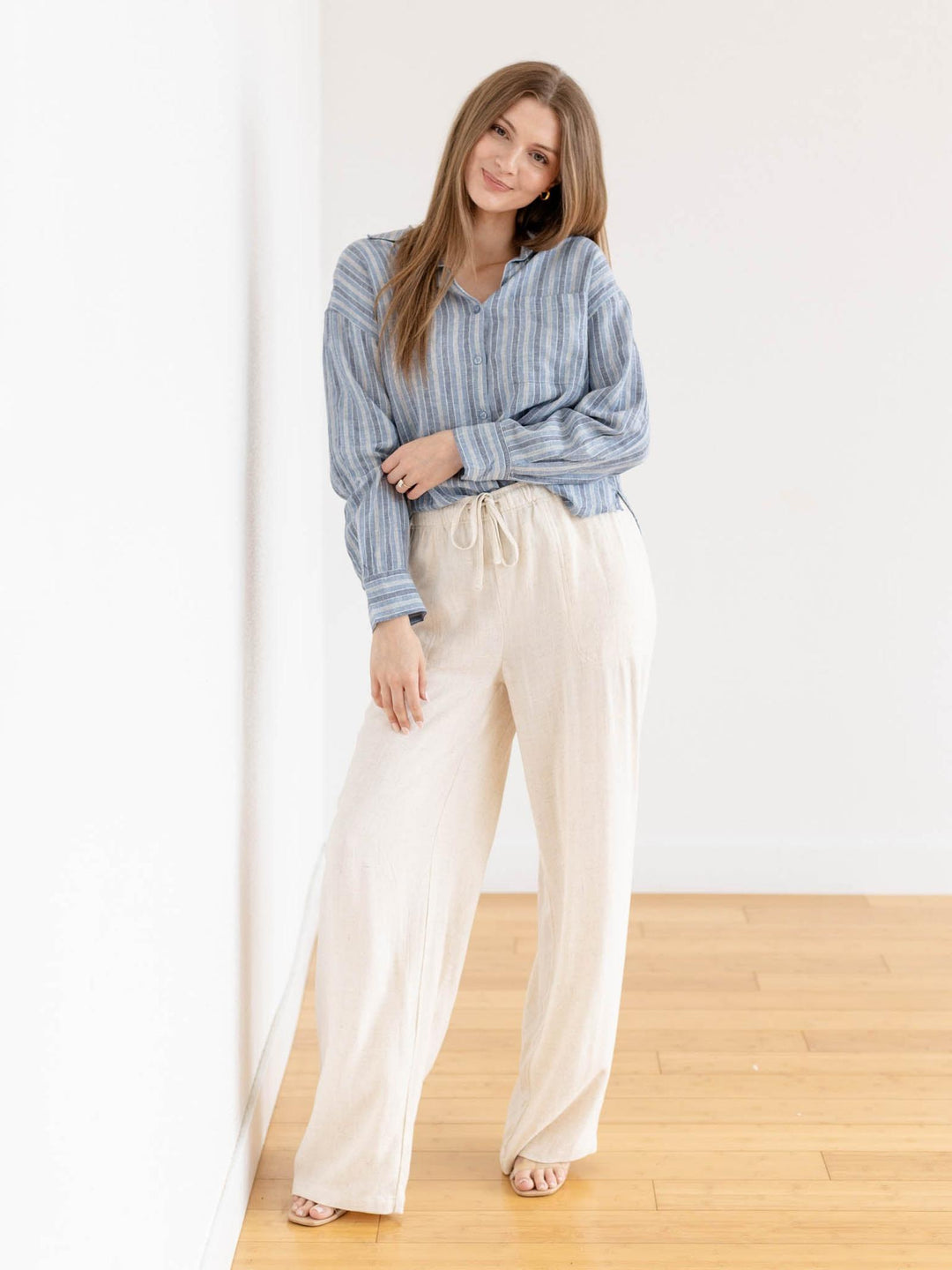 washed blue stripe button down top