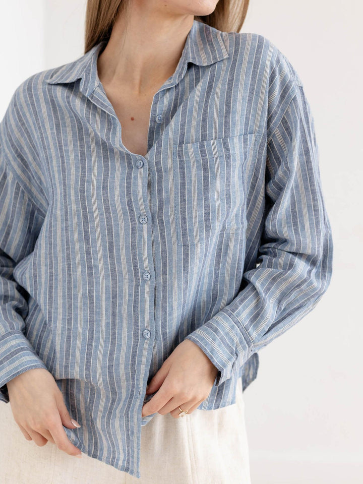 washed blue stripe button down top