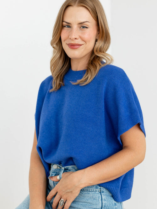 bright blue boxy sweater knit top