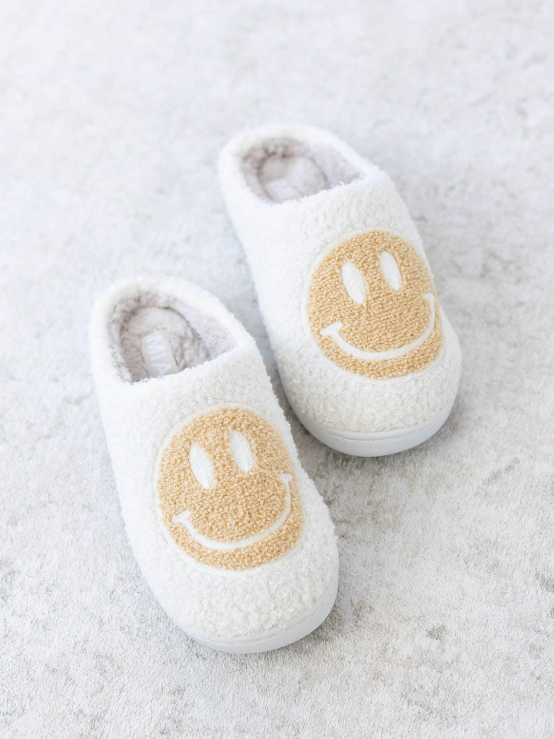 oatmeal smiley slippers