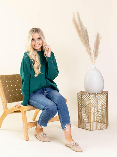 green sweater