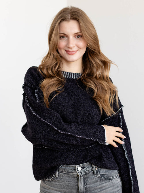 black reverse seam sweater