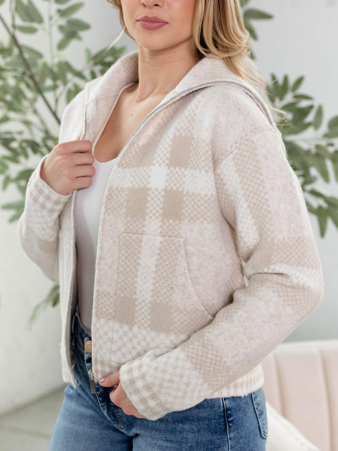 tan and white checkered bomber jacket
