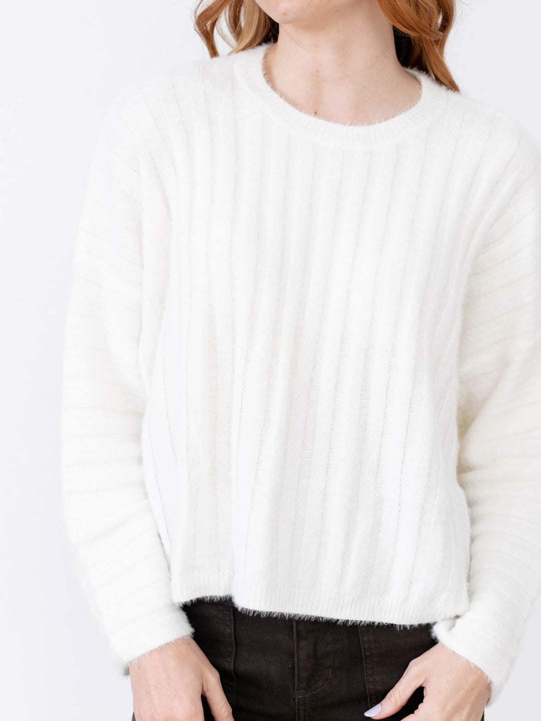 fuzzy white sweater