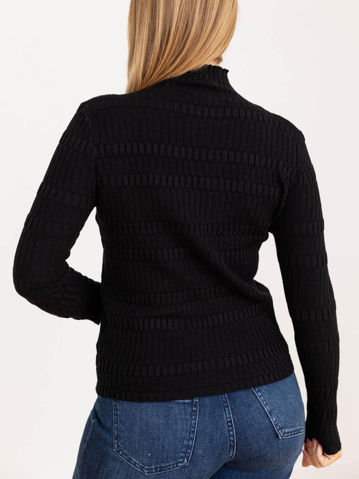 black textured mock neck top