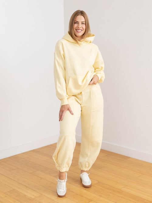 relaxed yellow hooded sweatshirt