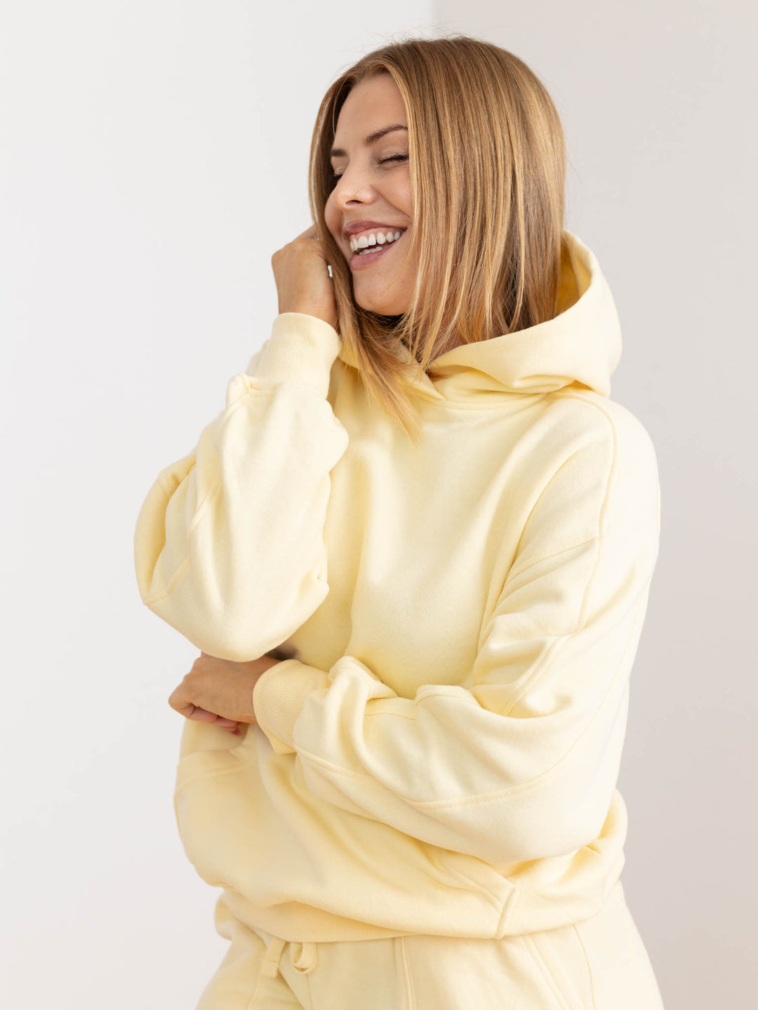 relaxed yellow hooded sweatshirt