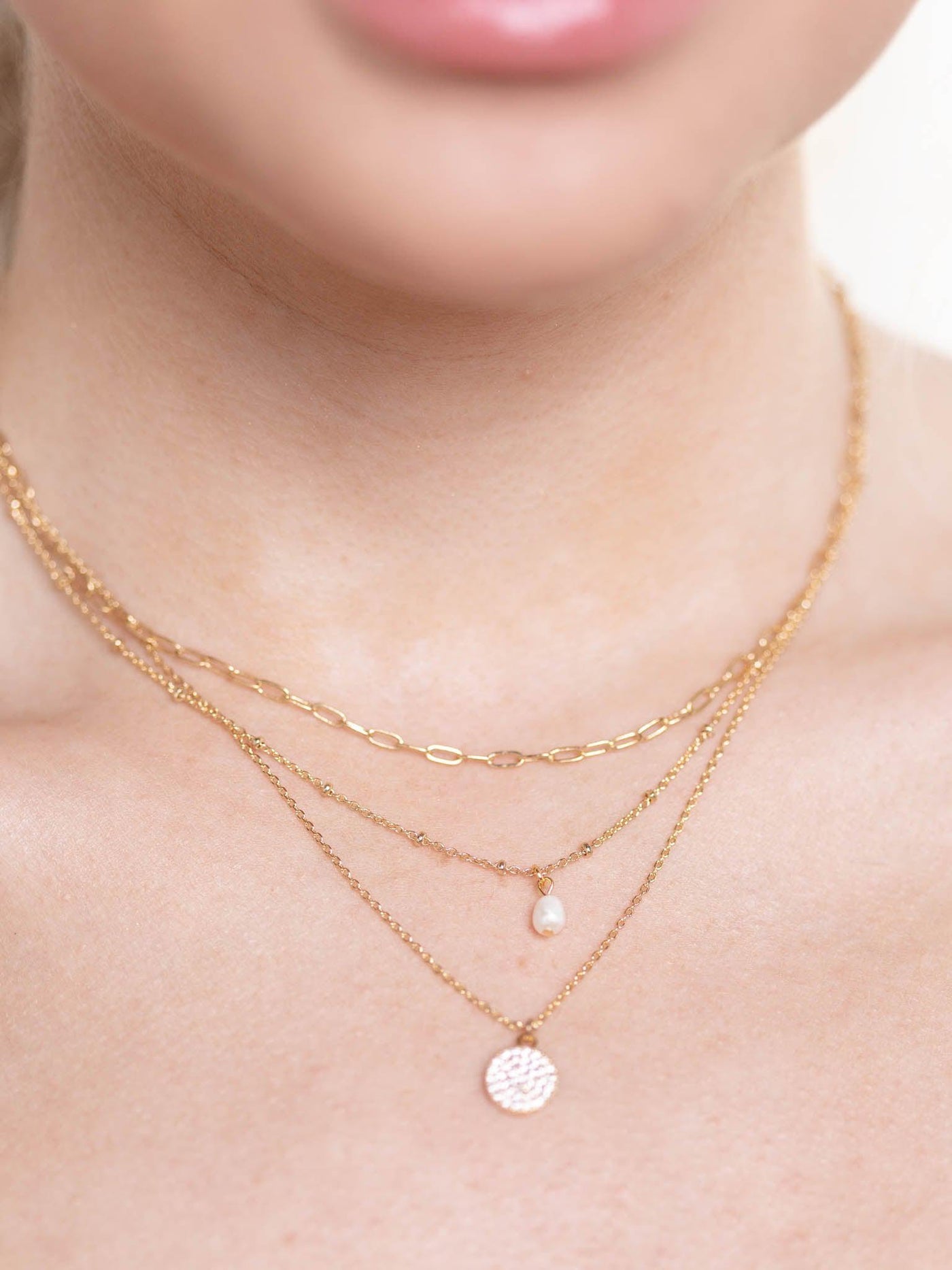 layered pearl and cz stone necklace