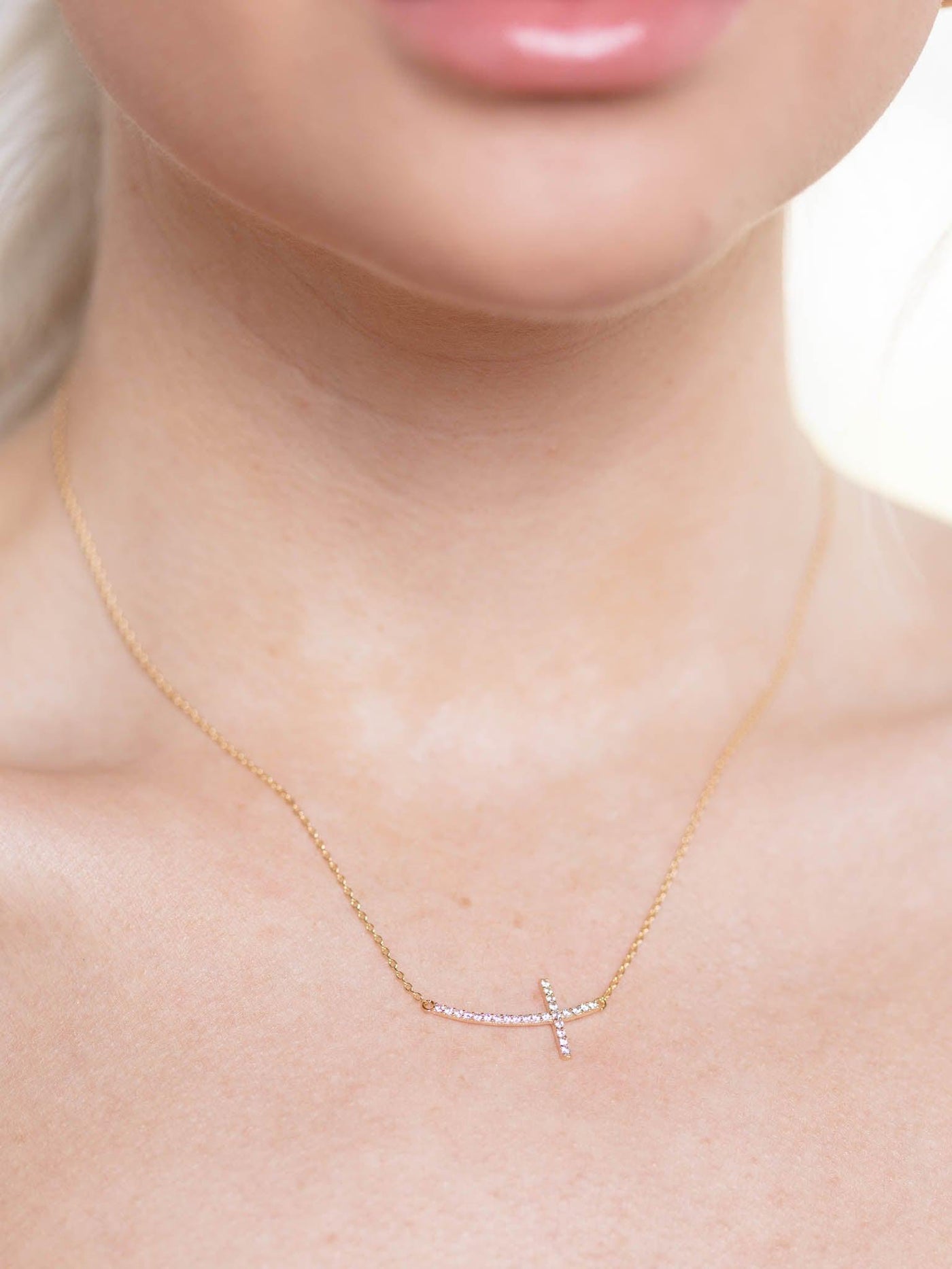 curve cross necklace