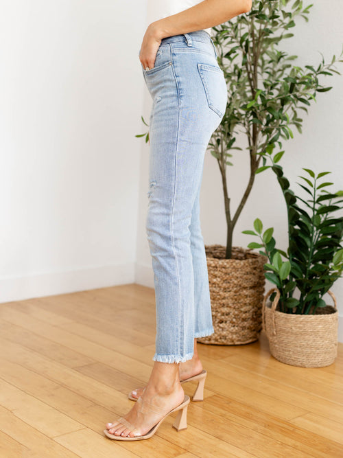 frayed light wash distressed slim denim