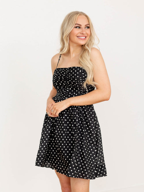 black and white polka dot mini dress
