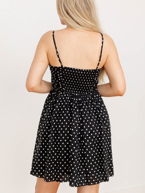 black and white polka dot mini dress