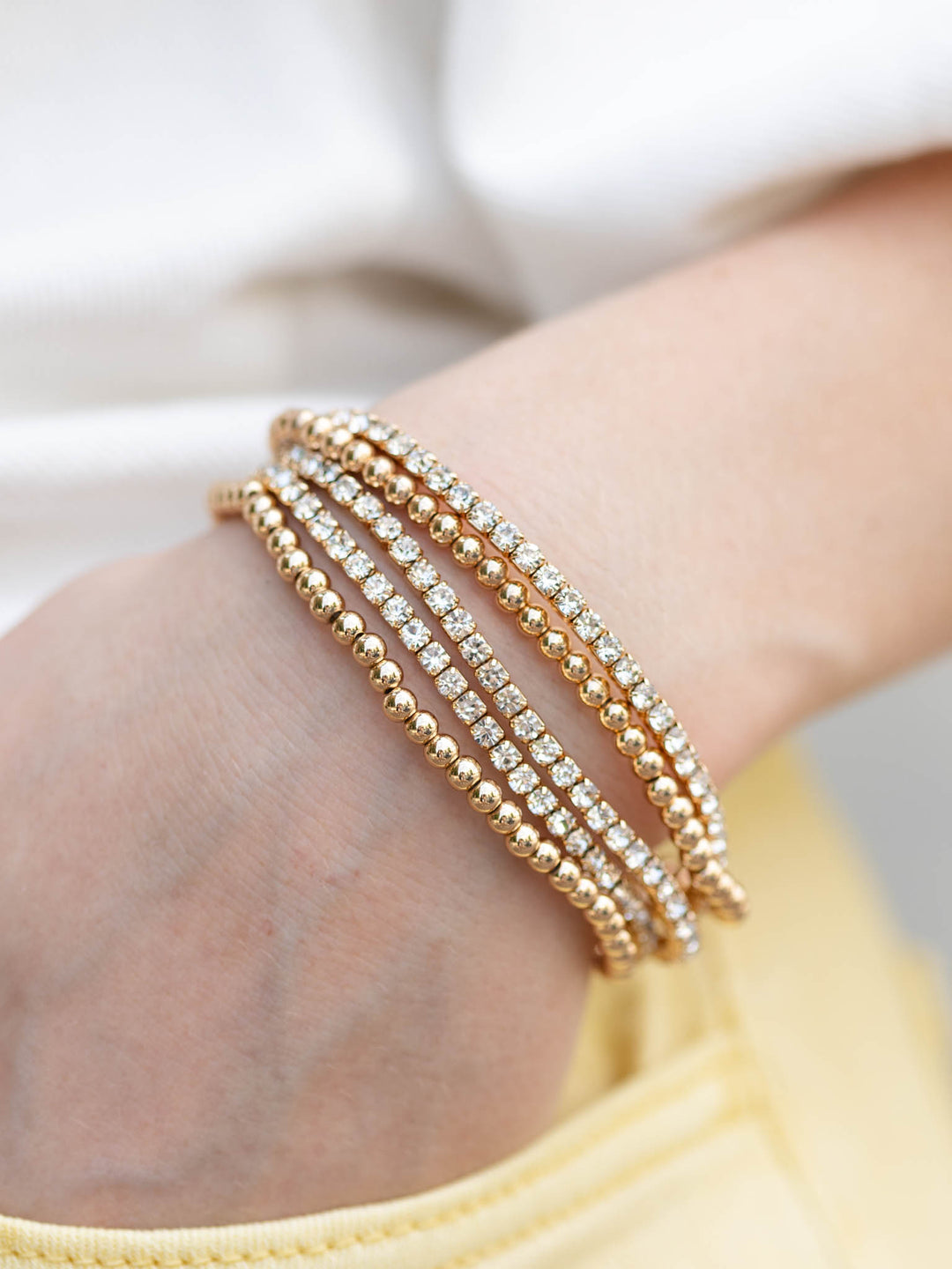 Stretchy metal breaded and rhinestone bracelets