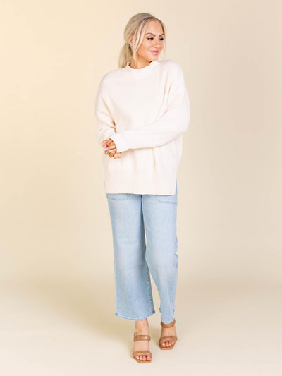 cream sweater