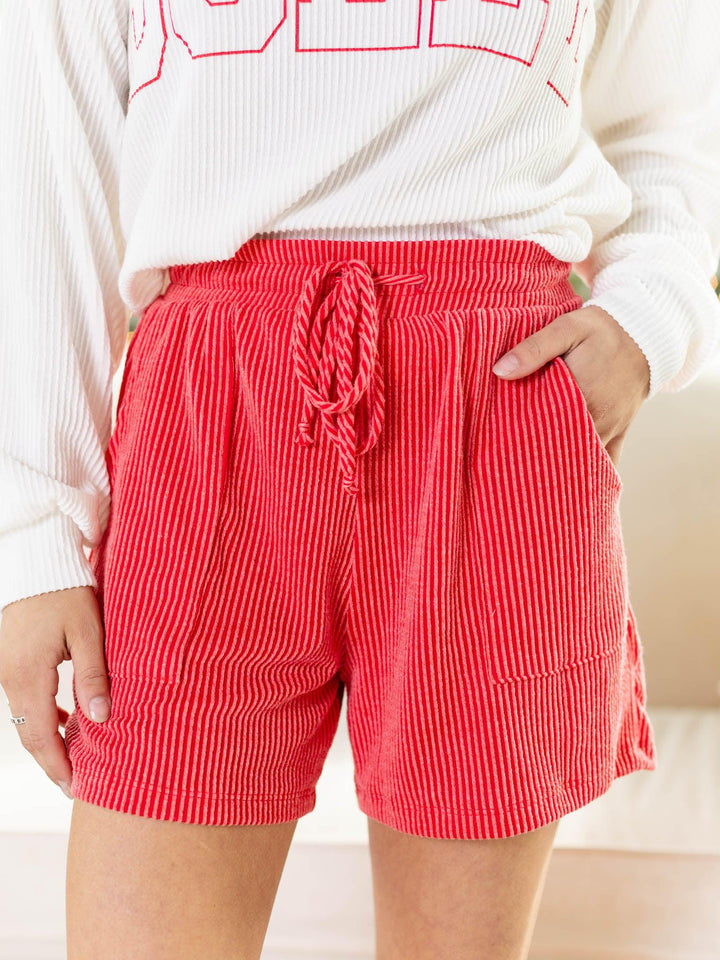 red textured shorts