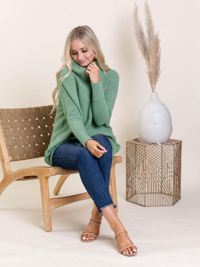green sweater