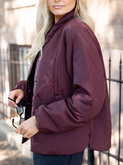 puffy maroon jacket