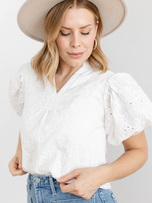 white eyelet embroidered v neck top