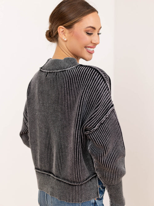 washed black exposed seam sweater