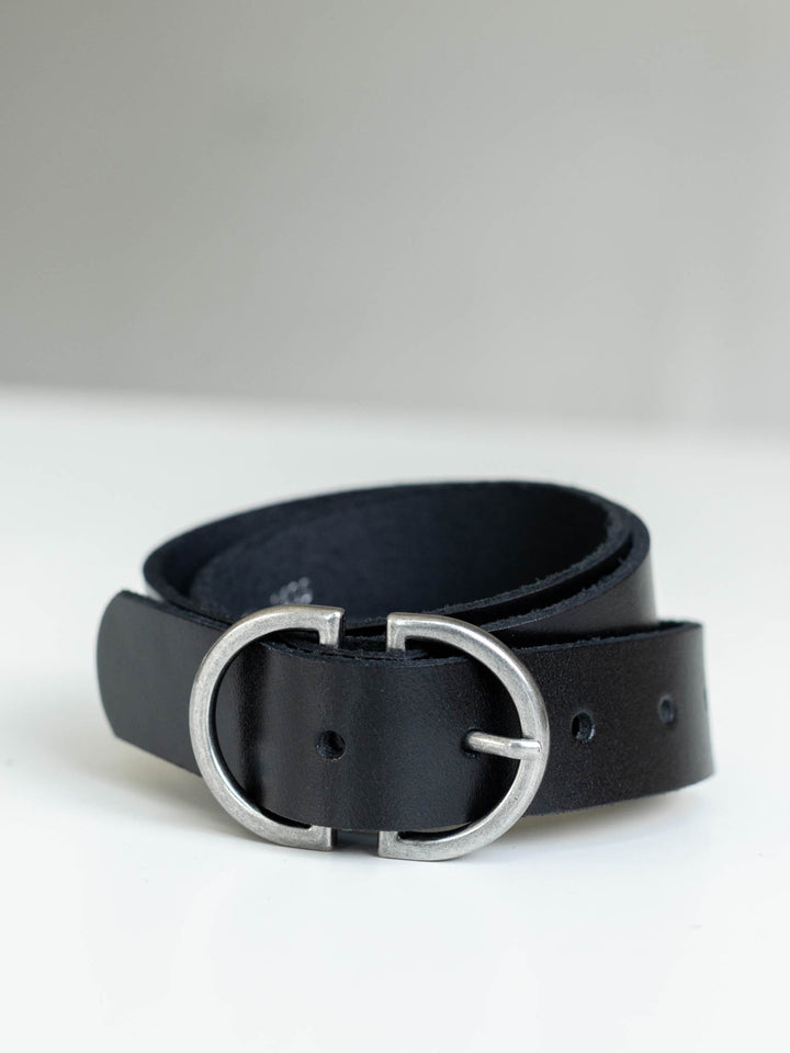 Black genuine leather belt with a striking silver D-ring buckle.