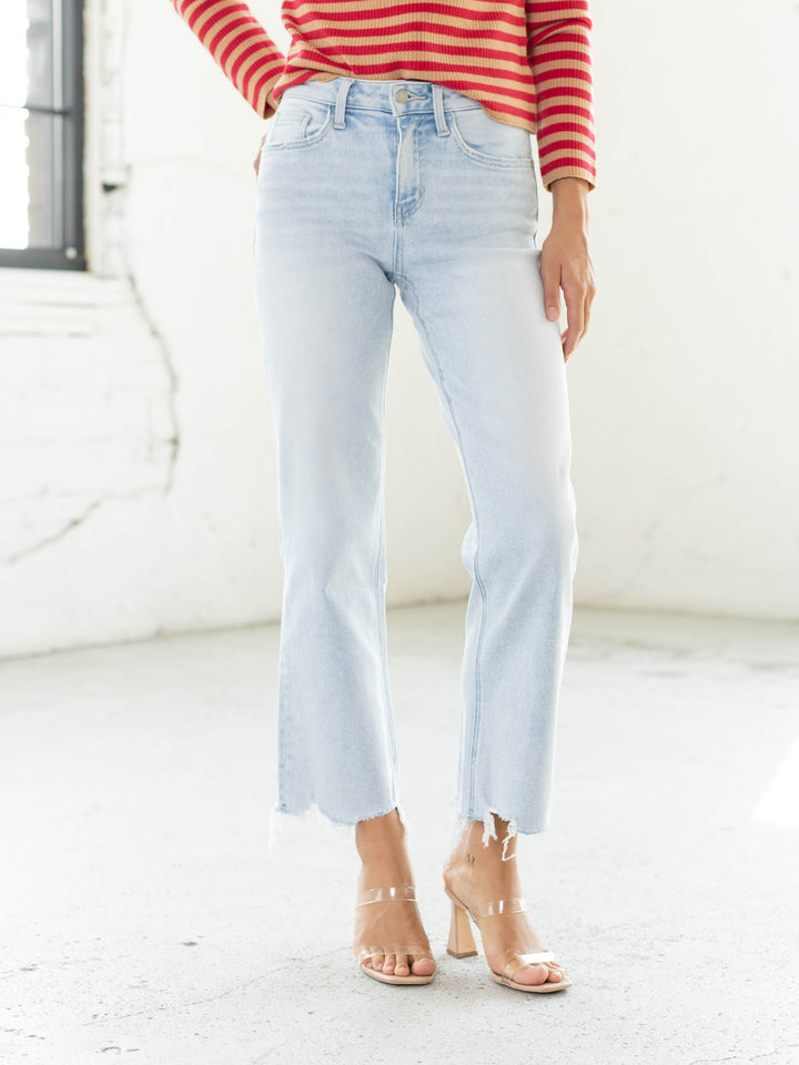 light wash distressed hem denim
