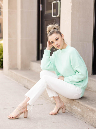 light green sweater