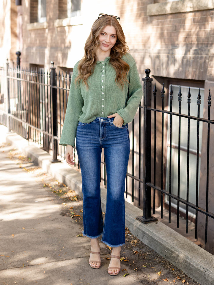 light green button front sweater